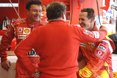 Michael (5th pl.) happy with Jean Todt
