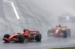 Both Ferraris during water racing