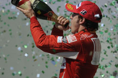 Fernando on the podium with champagne