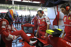Fernando enters his cockpit