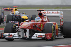 Fernando defending 2nd place against Mark Webber