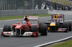 Fernando holds Mark Webber in distance